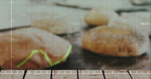 Zen pebbles with green growth chart overlay on wooden tabletop for wellness and business