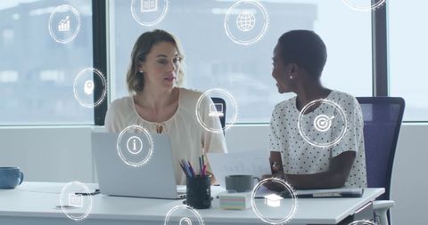 Diverse Businesswomen Discussing Ideas with Digital Interface