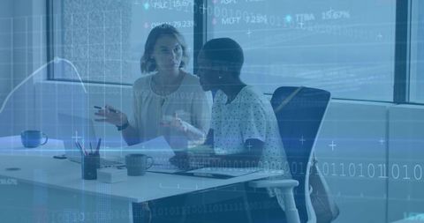 Business Colleagues Strategizing in Modern Office