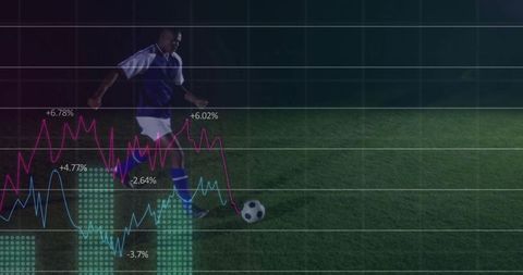 Soccer Player Kicking Ball with Digital Chart Overlay at Night