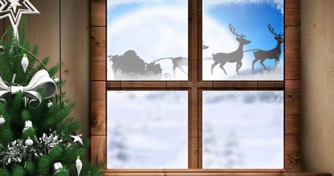 Santa's Sleigh and Reindeer Viewed Through Frosted Window