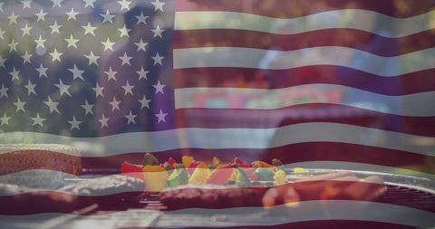 American Flag Overlay with Barbecue and Friends Celebrating Outdoors