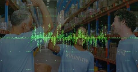 Volunteers Collaborating in Warehouse with Digital Financial Overlay