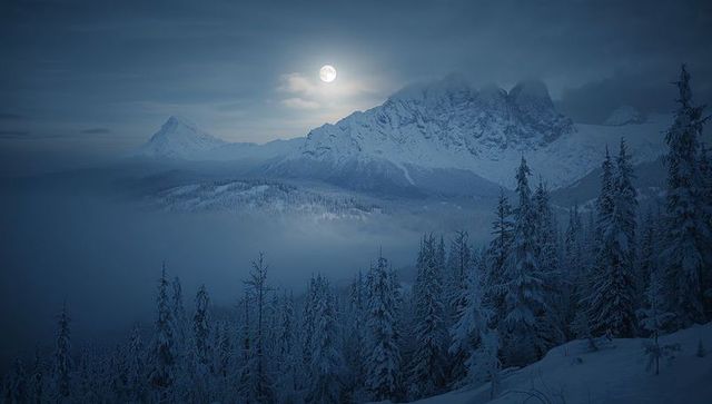 Full Moon Over Snowy Mountain Ridge With Fog-Shrouded Alpine Pines and Moonlit Valley