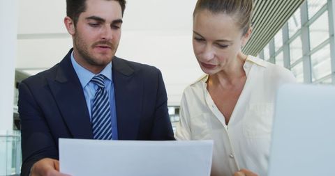 Business Professionals Collaborating On Office Documents - Download Free Stock Images Pikwizard.com