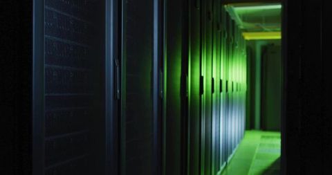 Glowing green data center corridor with server racks