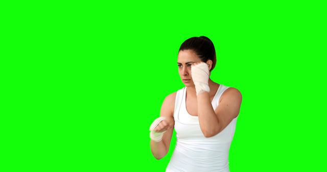 Female Boxer Training with Hand Wraps on Green Screen Background - Download Free Stock Images Pikwizard.com