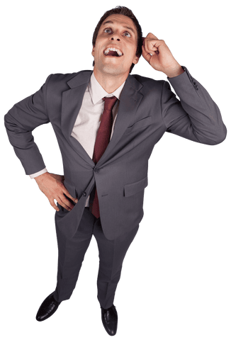 Surprised Businessman Looking Up on Transparent