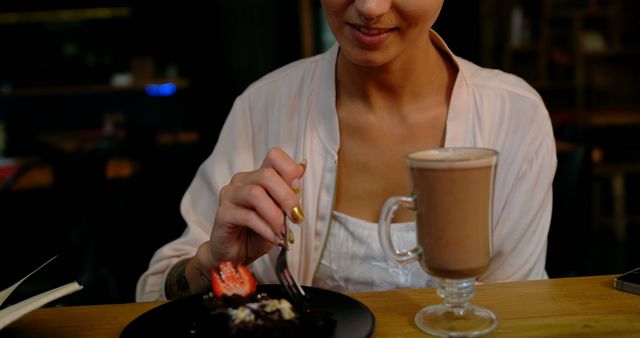 Woman Enjoying Cake and Hot Chocolate at Café - Download Free Stock Images Pikwizard.com