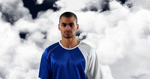 Confident Athlete Against Dramatic Cloudy Sky