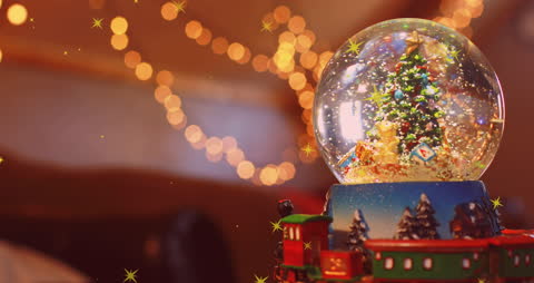 Festive Snow Globe Animation with Christmas Tree