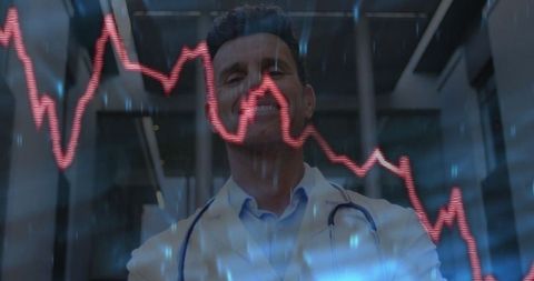 Doctor analyzing futuristic medical graph in analysis room