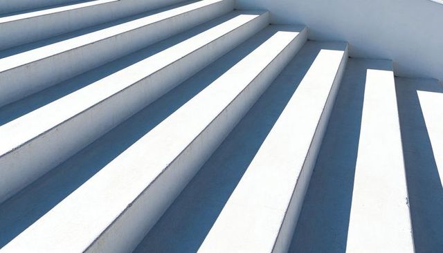 Minimal White Concrete Steps Casting Crisp Diagonal Shadows, Modern Architectural Geometry
