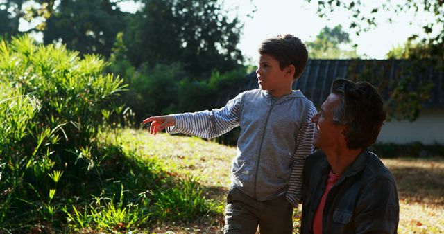 Father and Son Bonding Outdoors in Nature - Download Free Stock Images Pikwizard.com