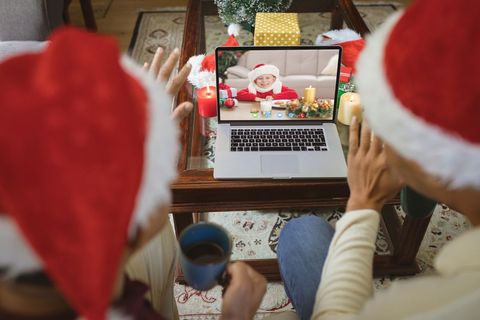 Couple Video Chatting With Girl During Christmas Celebration - Download Free Stock Images Pikwizard.com