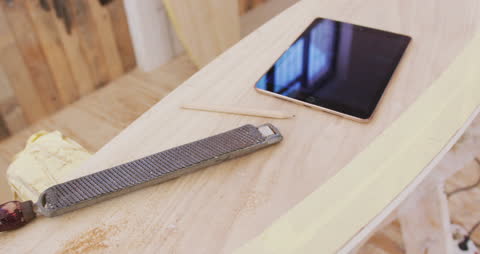 Surfboard Design Crafting with Essential Tools and Tablet