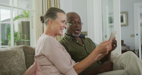 Happy Senior Couple Using Tablet Together at Home - Download Free Stock Images Pikwizard.com