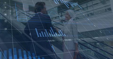 Business Professionals Analyzing Financial Graphs