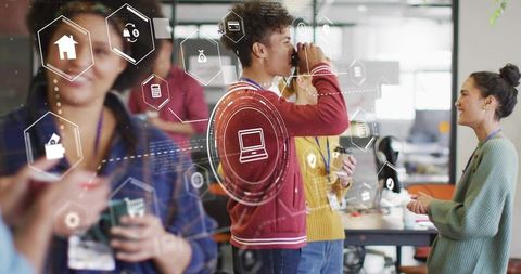 Collaboration in modern office, digital icons overlay