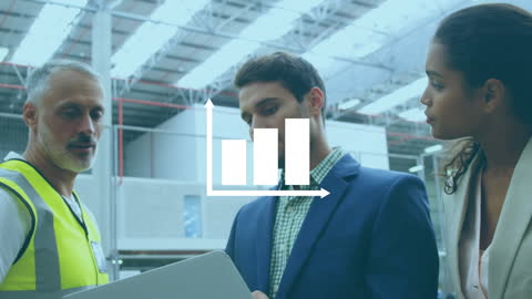 Multiracial Team Analyzing Financial Report in Warehouse Setting