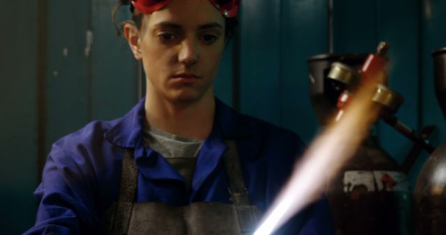 Young Welder in Protective Gear Working in Workshop - Download Free Stock Images Pikwizard.com