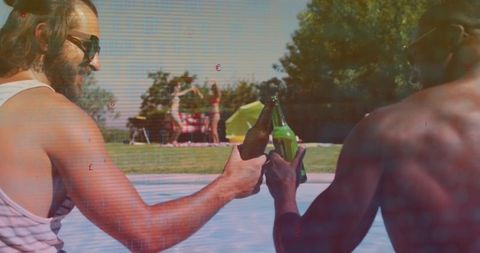 Sunlit Poolside Toast Clinking Green Bottles Between Friends Relaxing by Backyard Lawn