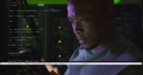 focused programmer working in high-tech server environment - Download Free Stock Images Pikwizard.com