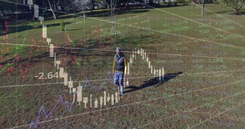 Financial data overlay on man walking in park setting