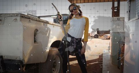 Confident Woman Refuels Car with Digital World Map Overlay