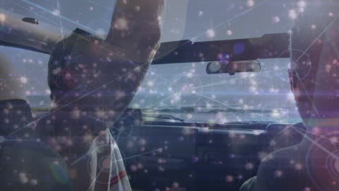 Digital Network Overlay on Friends Driving by the Ocean