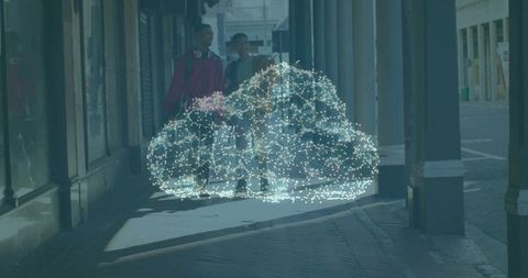 Friends walking past holographic cloud network under urban colonnade