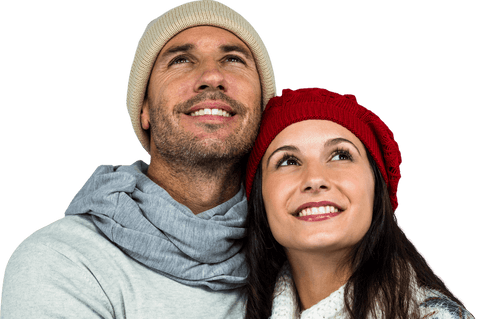 Smiling Couple in Winter Wear Looking Up with Transparent Background