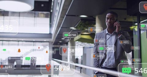 Businessman walking and talking on smartphone with augmented reality notifications overlay