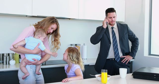 Busy Family Morning Routine in Modern Kitchen - Download Free Stock Images Pikwizard.com