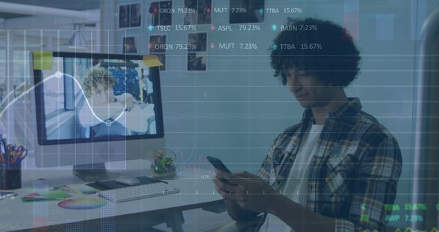 Young Man Analyzing Data on Phone in Modern Office - Download Free Stock Images Pikwizard.com