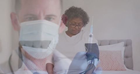 Doctor Preparing Vaccine for Woman in Hospital