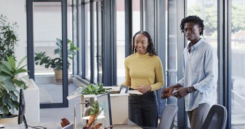 Coworkers engaging during office meeting setting