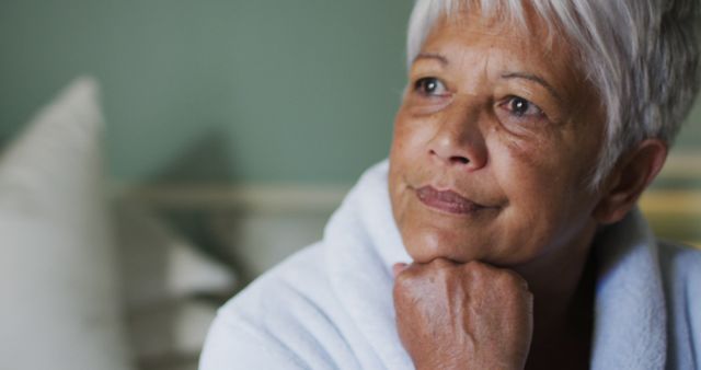 Thoughtful Elderly Woman Relaxing at Home - Download Free Stock Images Pikwizard.com