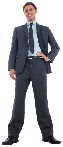 Happy Businessman Standing Confidently with Hand on Hip
