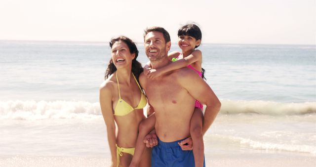 Happy Family Enjoying Sunny Day on Beach - Download Free Stock Images Pikwizard.com