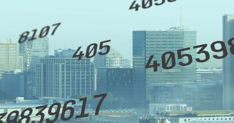 Futuristic cityscape with digital overlay of changing numbers