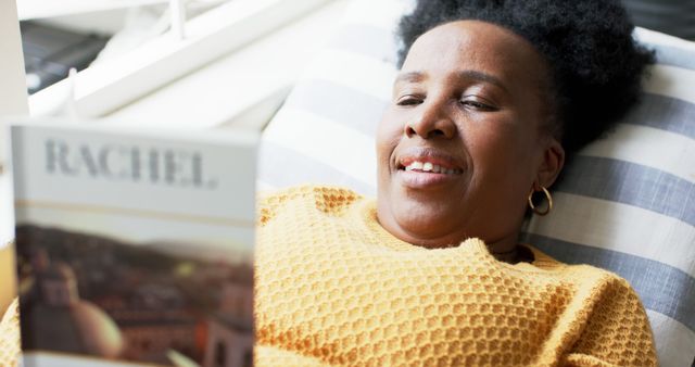 Smiling Elderly Woman Relaxing While Reading a Book at Home - Download Free Stock Images Pikwizard.com