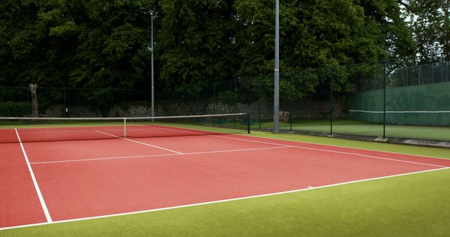 Empty Outdoor Tennis Court with Red and Green Surface - Download Free Stock Images Pikwizard.com