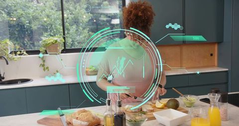 Woman preparing breakfast using augmented reality hud and smartwatch in modern kitchen