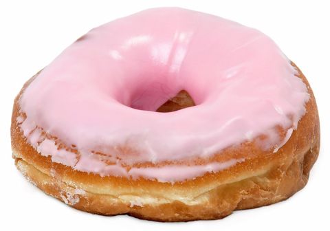 Pink frosted donut on white background