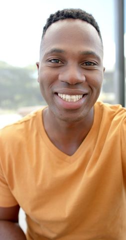 Smiling African American Man Making Video Call at Home