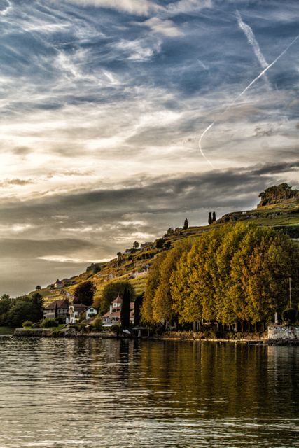 Scenic Lakeside Village with Autumn Foliage at Sunset - Download Free Stock Photos Pikwizard.com