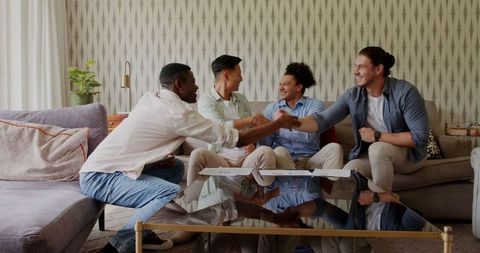 Group of friends discussing wedding plans over coffee