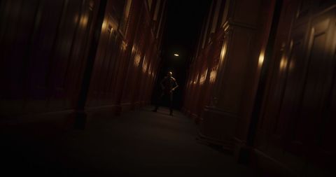 Eerie Silhouette in Dimly Lit Corridor Radiating Mystery - Download Free Stock Images Pikwizard.com