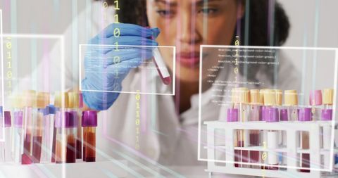 Scientist Analyzing Blood Samples with Digital Data Overlay - Download Free Stock Images Pikwizard.com
